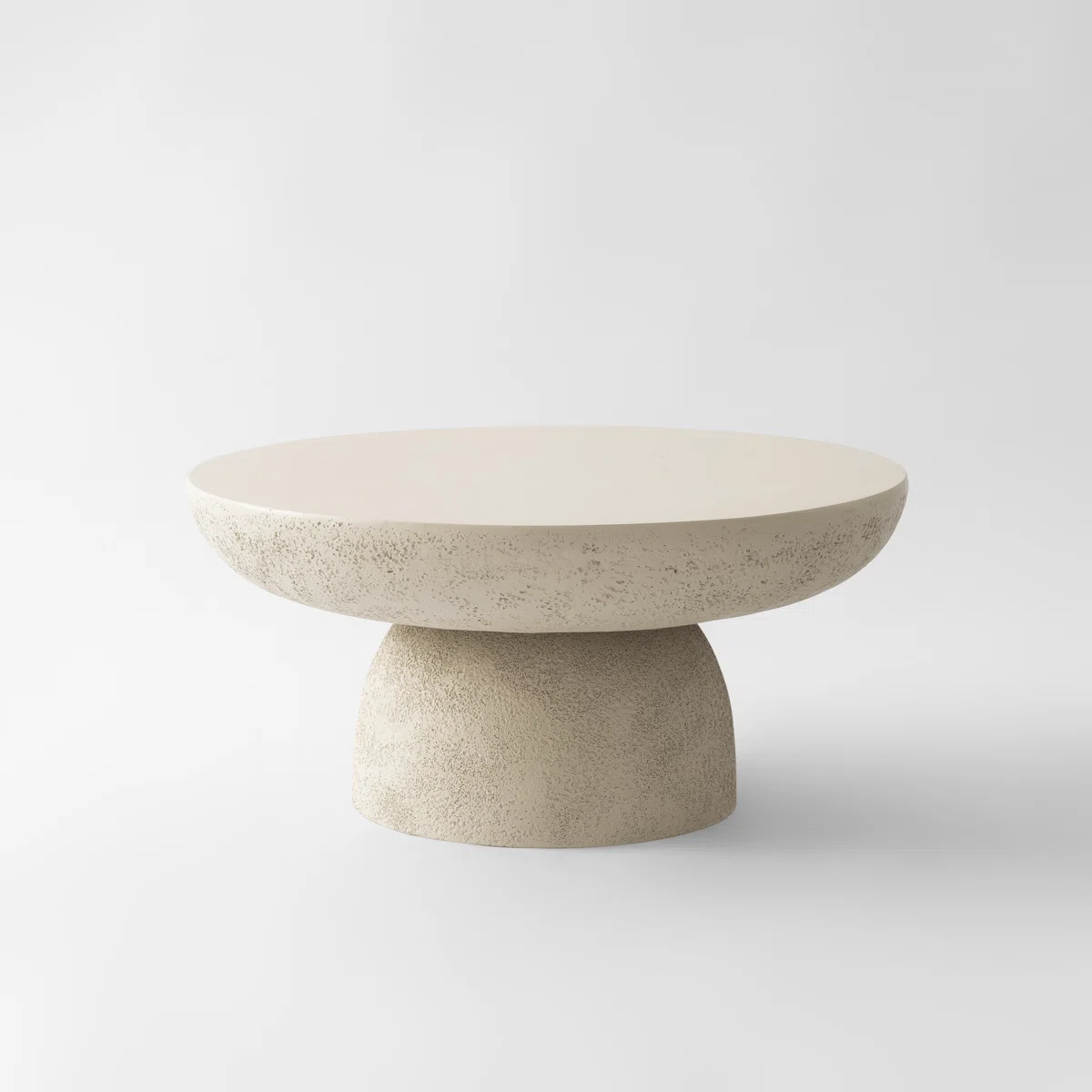 Table basse Galet – Effet travertin mat, design sculptural